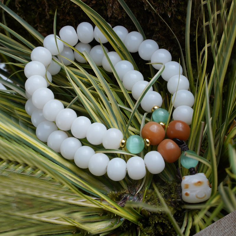 PUTI-White Apple Bead Handheld